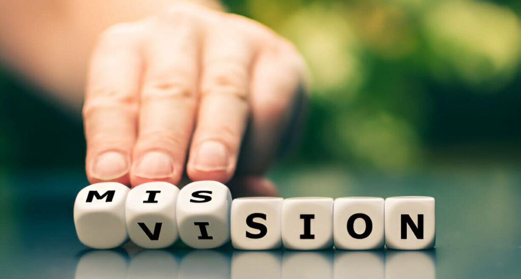 Mission spelled with cubes on a table